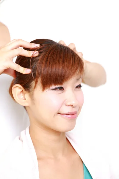 Woman getting a head massage　 — Stockfoto